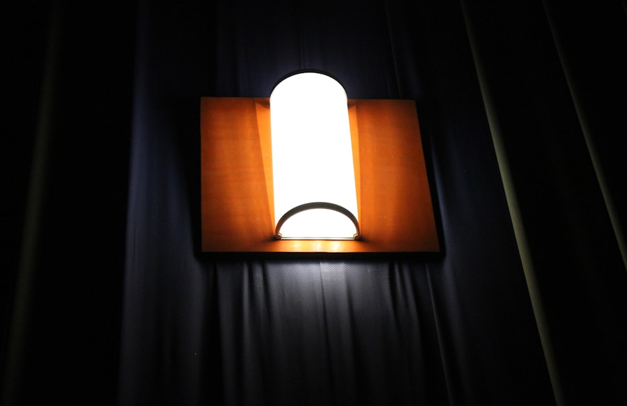 Photo Wooden hollow carved wall lamp