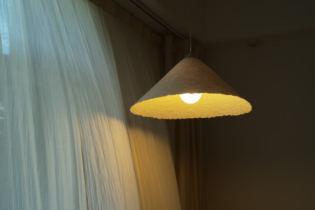 Photo natural fiber shade wall lamp